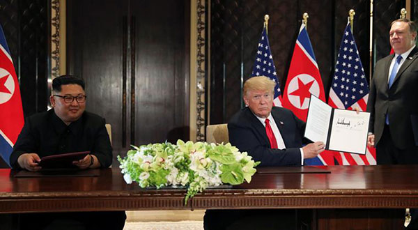 Trump, Kim Sign ‘Comprehensive' Document after Historic Summit Trump, Kim Sign ‘Comprehensive’ Document after Historic Summit